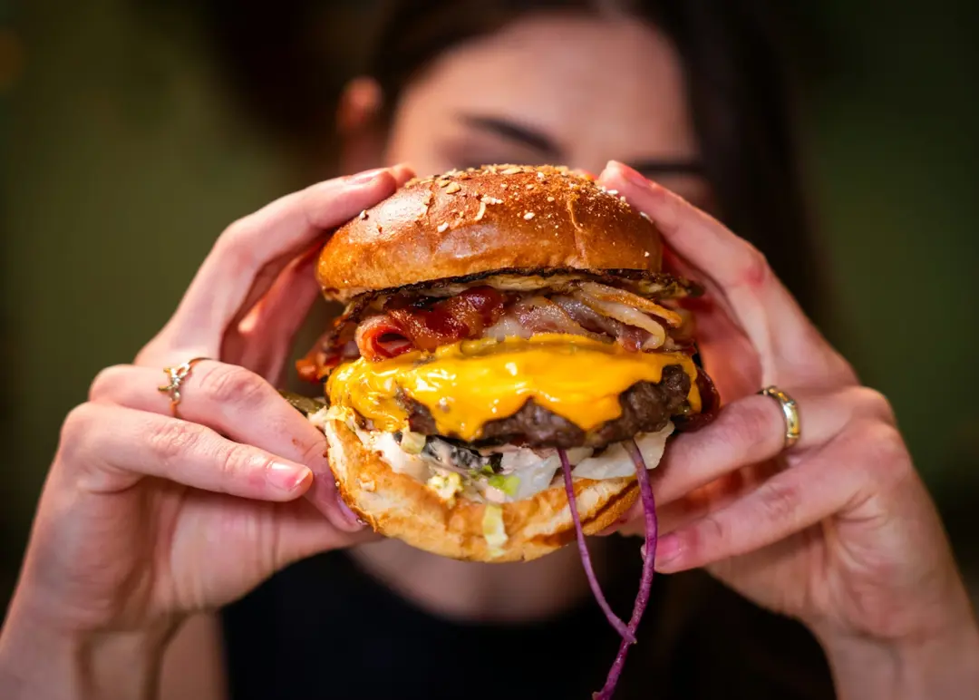 CRSP Signature Cheesy Burger with dripping cheese